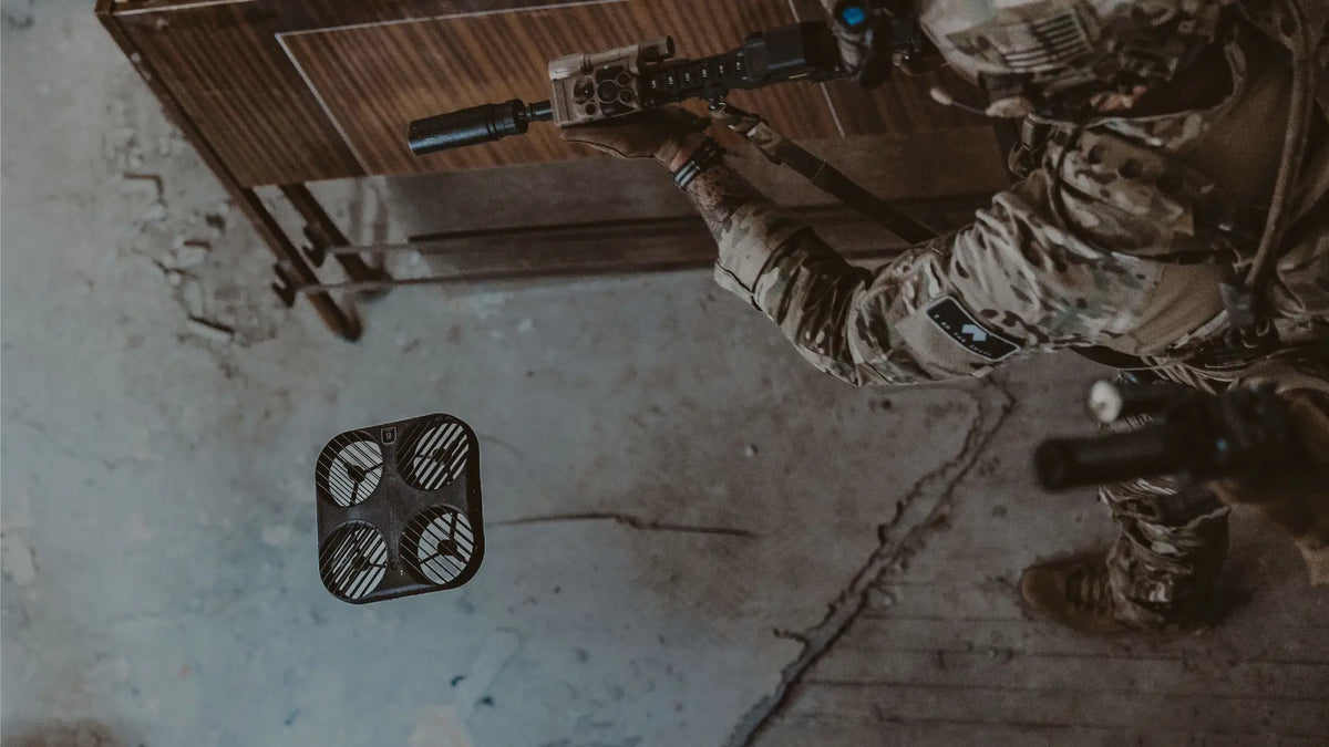 DarkHive YellowJacket tactical drone supporting indoor reconnaissance for military and law enforcement teams during close-quarters tactical operations.