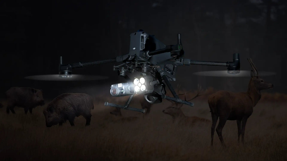 DJI Matrice 400 thermal drone detecting deer and wild hogs during a nighttime wildlife scouting and hunting mission.