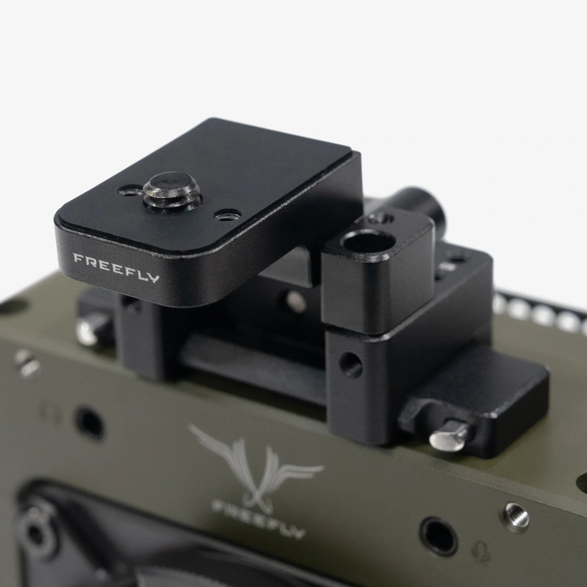 Freefly Adjustable Accessory Mount installed on an Ember S5K camera, close-up