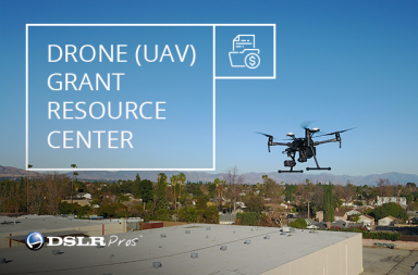 Drone flying over a commercial building with Drone Grant Resource Center graphic, highlighting UAV grant funding opportunities for public safety, government agencies, enterprise drone programs, and commercial drone operations.