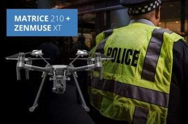 Police officer with a DJI Matrice 210 and Zenmuse XT thermal drone, demonstrating law enforcement drone applications for public safety, search and rescue, tactical response, HAZMAT incidents, traffic management, and emergency operations.