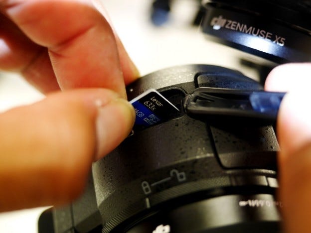 SD memory card used for drone photography and aerial video, illustrating speed class ratings, read and write performance, storage capacity, and recommended memory cards for DJI and enterprise drone operations.