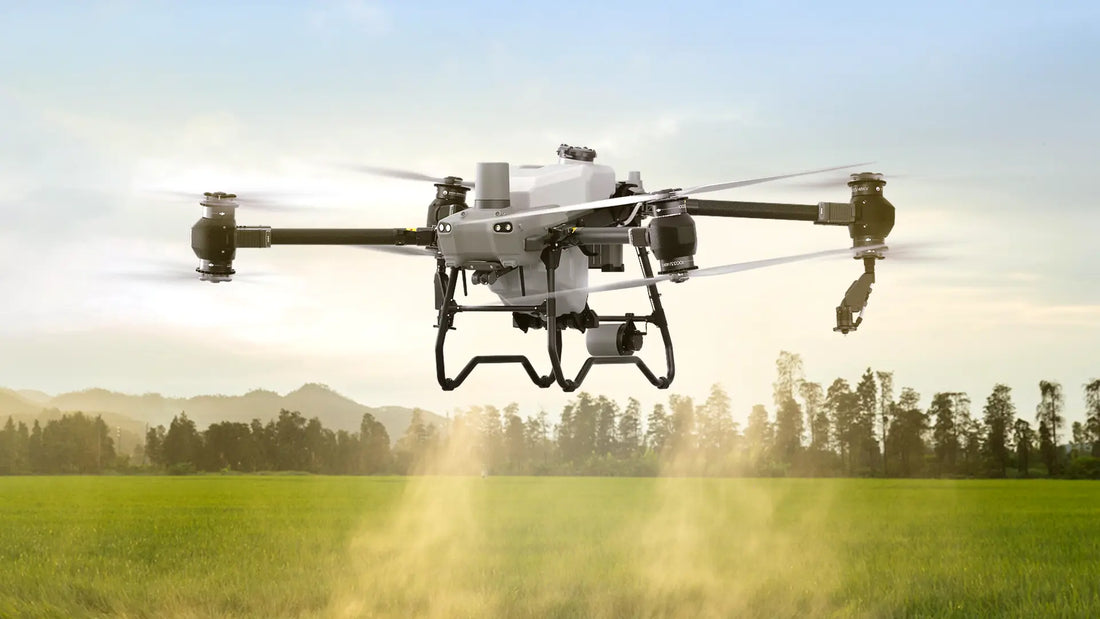 Agricultural spraying drone applying crop protection products over farmland for precision agriculture and field management.