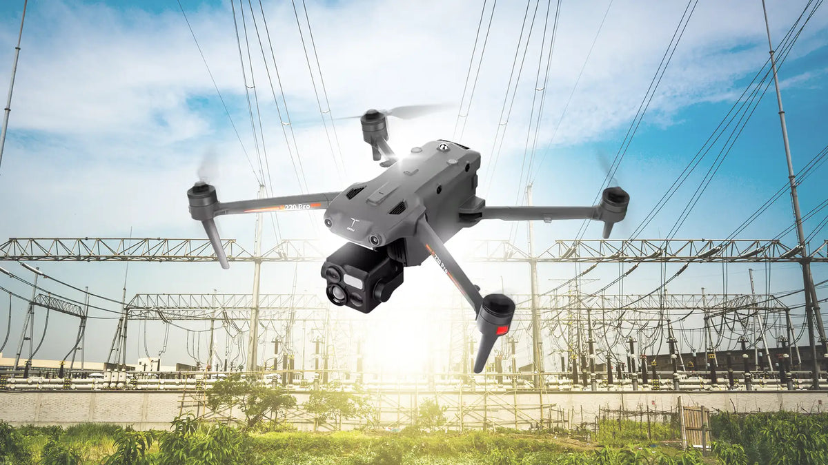 GDU S220 Pro drone performing infrastructure inspection in open field
