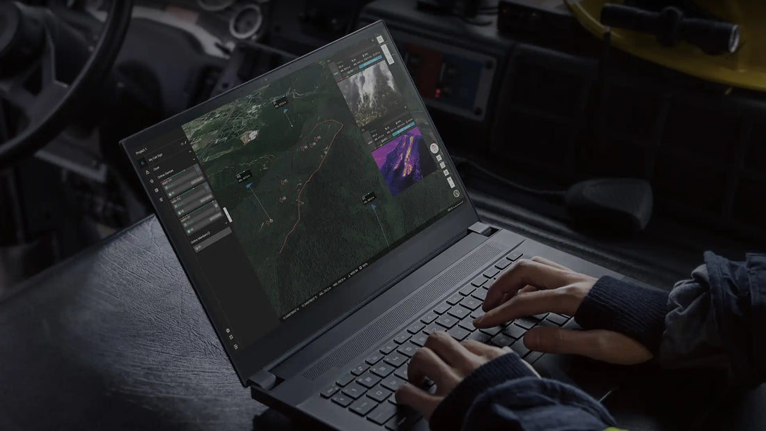 Operator using drone flight planning software to create automated survey missions, manage flight paths, review mapping data, and monitor operations.