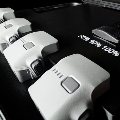 Close-up of Matrice 4 batteries seated in the PRCS charging case