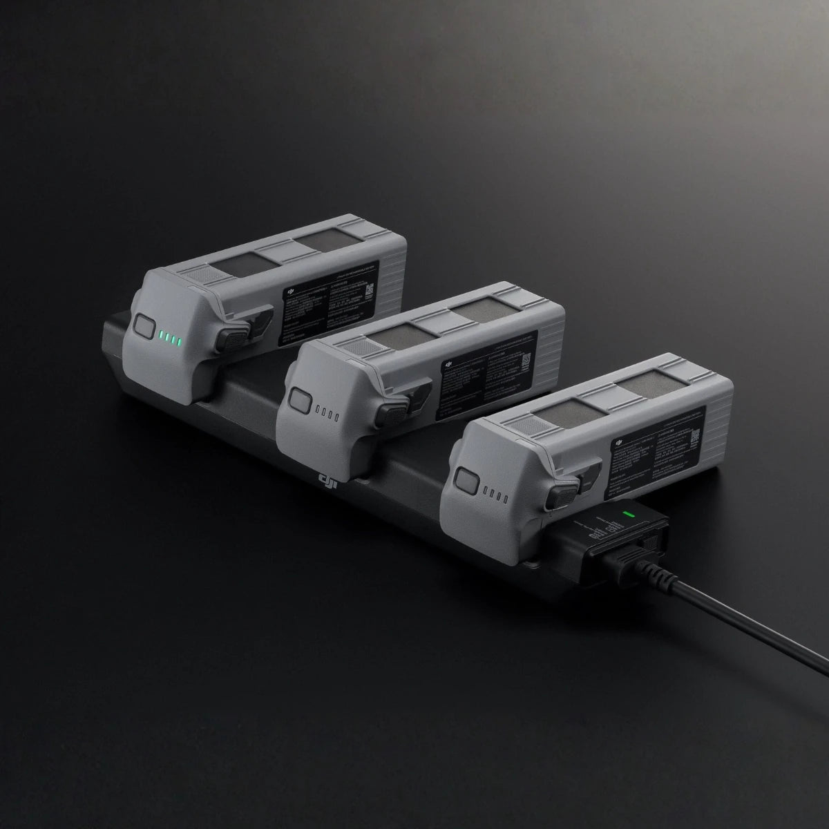 DJI Matrice 4 Series charging hub powering three batteries