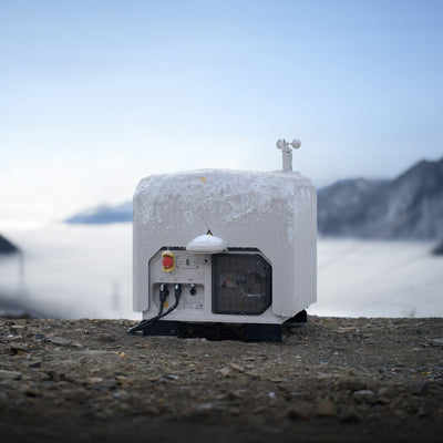DJI Dock 3 operating outdoors in icy mountain conditions