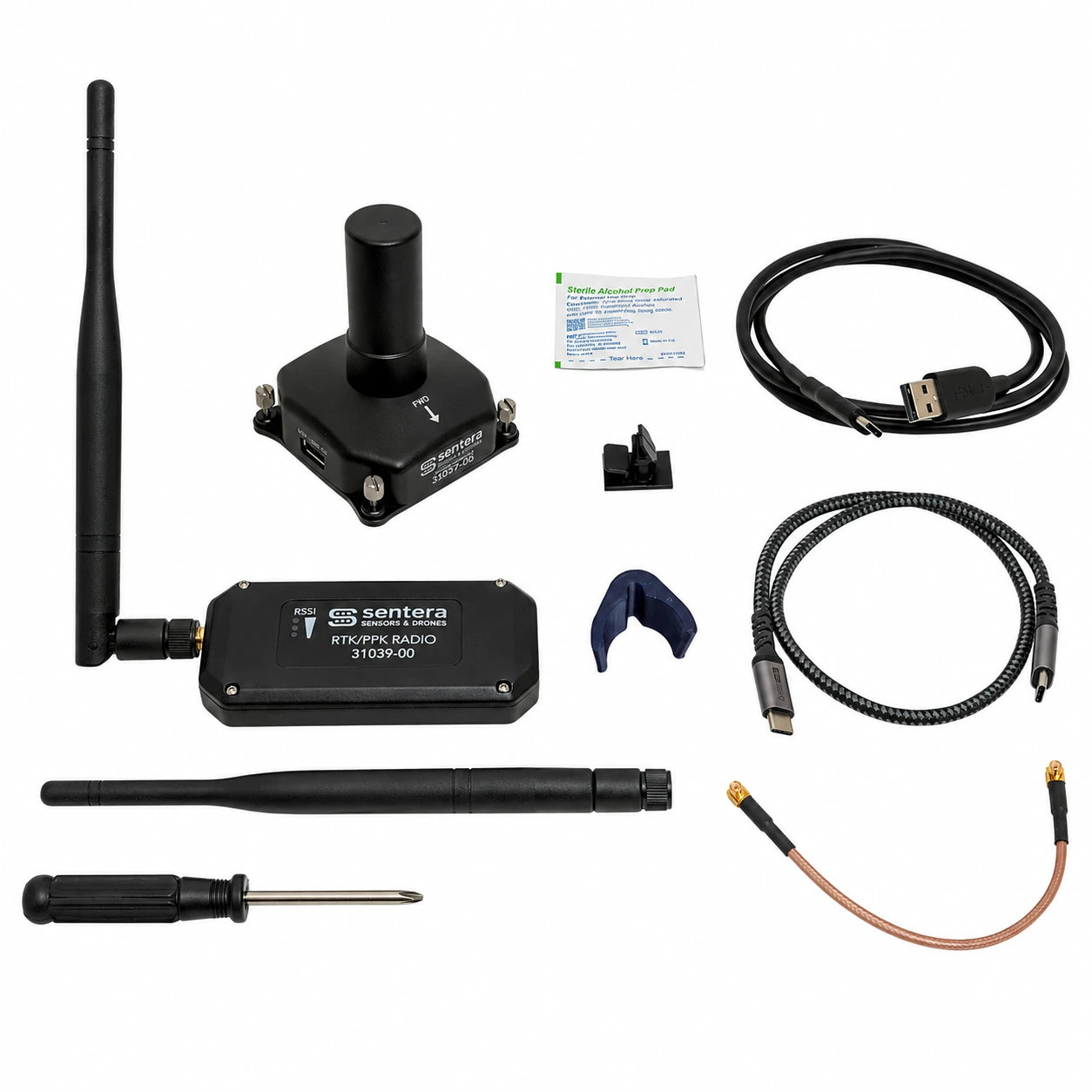 Sentera RTK/PPK module components with radios, antennas, cables, and tools